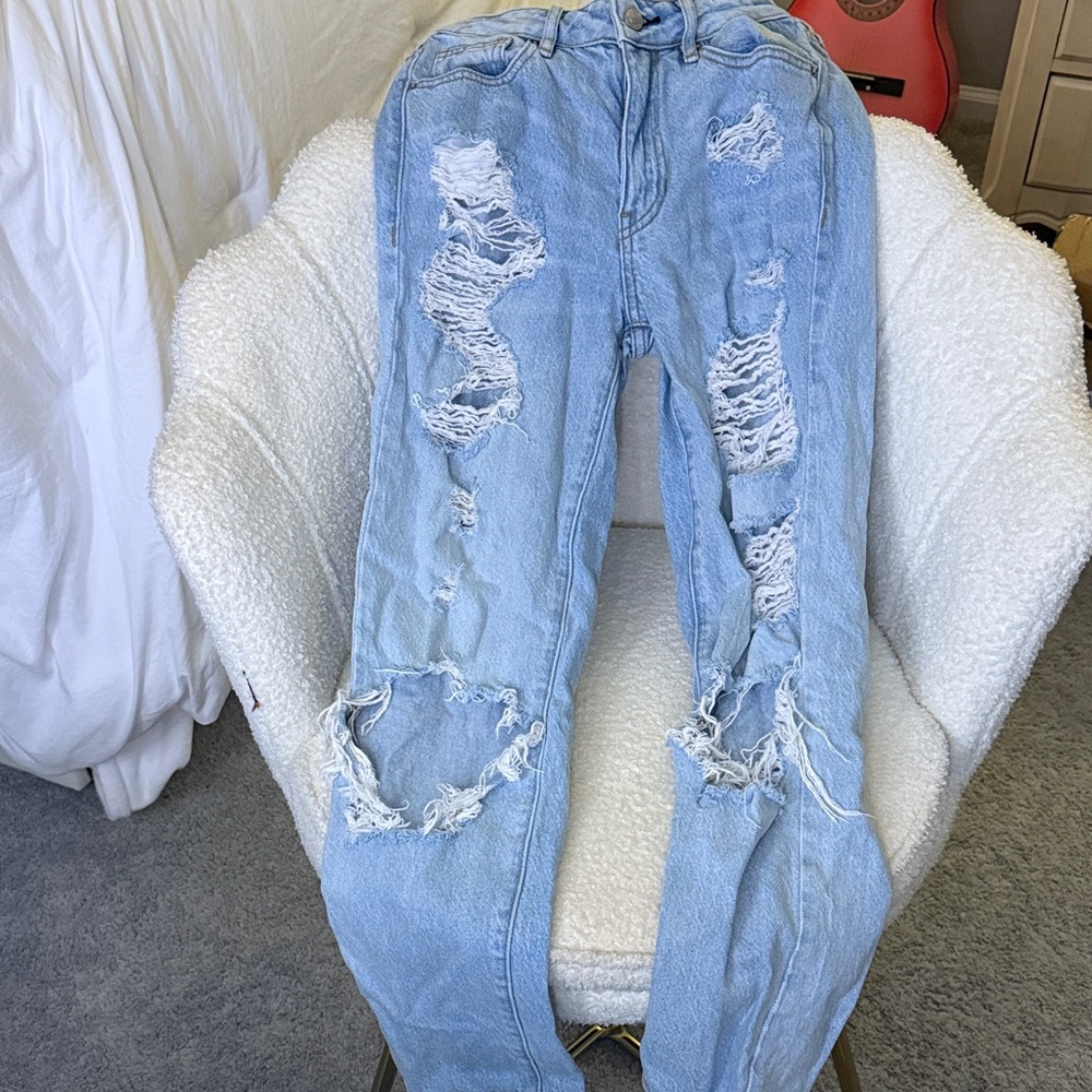 Distressed Light Blue Jeans